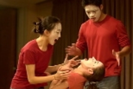 Vanessa Cheung (left) mimes escapades in an elevator with fellow mimes Tanya Burka, falling (face up) and Jonathan Ho in a performance last month.