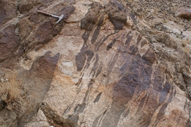 Shown here, rocks types on the surface were once molten magma, and crystalized at great depth in the Earth's crust.