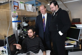 Ed Boyden, seated, and Joost Bonsen, right, co-teach the class "Neurotechnology Ventures." Rutledge Ellis-Behnke, center, also co-taught the class during its first few years.