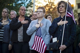 Some 200 students, faculty, staff, and community members came to pay their respects at the 7:30 a.m. ceremony.