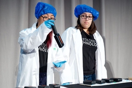 Students display their creation, building blocks called Struct, which all look the same but have different properties such as built-in magnets.