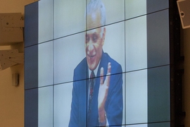 A projected image of the late Amar Bose, a longtime member of the MIT faculty and the founder of Bose Corporation