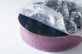 Bubble wrap, combined with a selective absorber, keeps heat from escaping the surface of the sponge. 
