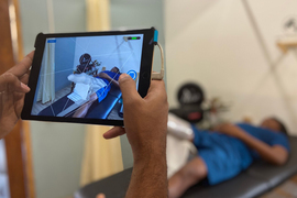 A patient is scanned for a prosthetic