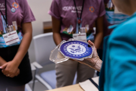 warren being presented a silicon wafer