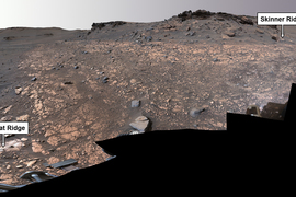 A vast rocky scene of Mars has two labels. On left is “Wildcat Ridge” and on right is “Skinner Ridge.” 