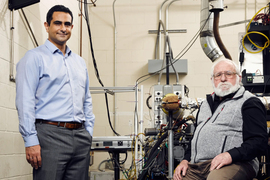 Emmanuel Kasseris and Leslie Bromberg with machinery in background