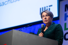 Maura Healey speaks at the podium.